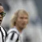 3. Edgar Davids (Kacamata) - Pria asal Belanda ini merupakan salah satu pemain yang terkenal nyentrik dengan kacamatanya. Penyakit Glukoma yang menyerang syaraf mata menjadi alasan Davids menggunakan kacamata. (AFP/Marco Bertorello)