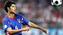 Croatian defender Vedran Corluka eyes a ball during the Euro 2008 Championships quarter-final football match Croatia vs. Turkey on June 20, 2008 at Ernst Happel Stadium in Vienna. AFP PHOTO / DDP - RONNY HARTMANN