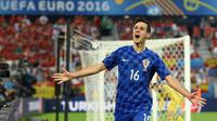 Ekspresi striker Kroasia, Nikola Kalinic, setelah mencetak gol balasan ke gawang Spanyol pada laga Grup D Piala Eropa 2016 di Stade Mahmut-Atlantique, Bordeaux, Rabu (22/6/2016) dini hari WIB. (AFP/Nicolas Tucat)