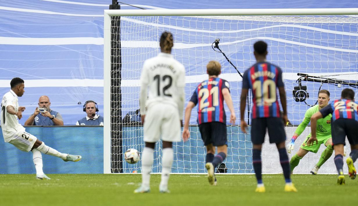Eksekusi penalti yang diambil langsung oleh Rodrygo berjalan mulus dan mengubah skor menjadi 3-1 untuk Real madrid. Skor 3-1 pun bertahan hingga laga usai. (AP/Manu Fernandez)