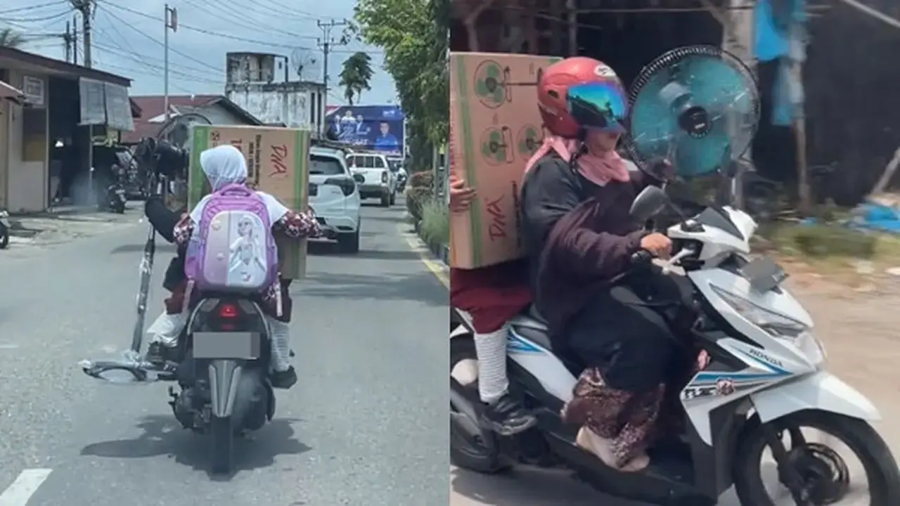 Tak Ada Lawan, Ibu-Ibu Bonceng Anak Sambil Bawa Kipas Angin Besar yang Sudah Dirakit