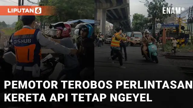 VIDEO: Dihadang Petugas, Pemotor Terobos Perlintasan Kereta Api Tetap Ngeyel Bikin Netizen Emosi
