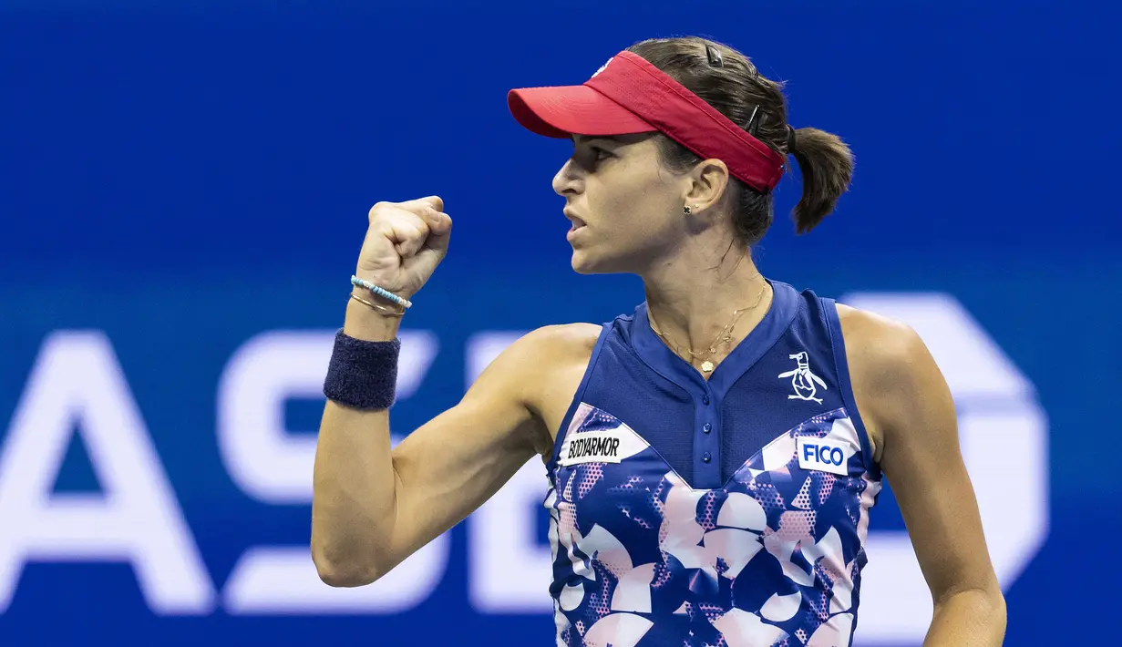 Laga pun akhirnya dimenangkan oleh Tomljanovic usai mengunci keunggulan di set ketiga dengan skor 6-1. (AFP/Corey Sipkin)
