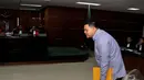 Teddy meminta KPK untuk mengusut lebih jauh praktek ijon proyek di Kementerian PDT, Pengadilan Tipikor, Jakarta, Senin (13/10/2014) (Liputan6.com/Miftahul Hayat) 