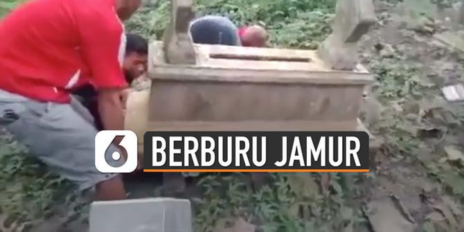 VIDEO: Pemuda Nekat Angkat Nisan Kuburan Demi Berburu Jamur