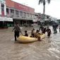 Hujan deras di Kabupaten Bogor menyebabkan sejumlah kecamatan mengalami banjir. (Liputan6.com/Achmad Sudarno)