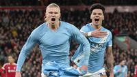 Pemain Manchester City, Erling Haaland, melakukan selebrasi setelah mencetak gol ke gawang Liverpool pada laga Liga Inggris di Stadion Anfield, Senin (9/2/2026) dini hari WIB. (AP Photo/Jon Super)
