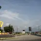 Foto ini diambil pada November 7, 2016 menunjukkan patung gajah mengangkat barbel di kota Pringsewu, Kabupaten Lampung, Sumatera Selatan. Dari tempat inilah banyak melahirkan legenda atlet angkat besi dan angkat berat Indonesia. (AFP Photo/GOH Chai Hin)