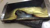 Penampakan Galaxy S7 Edge yang terbakar setelah dicharge semalaman (Sumber: Phone Arena)