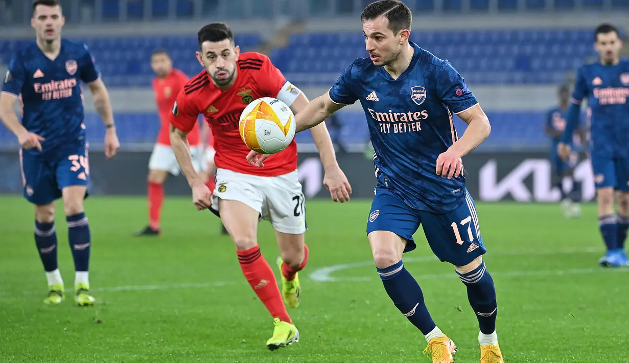 Memasuki menit-menit akhir, pertandingan berjalan semakin sengit. Namun sampai laga berakhir, Benfica 1 Arsenal 1. (Foto: AFP/Alberto Pizzoli)