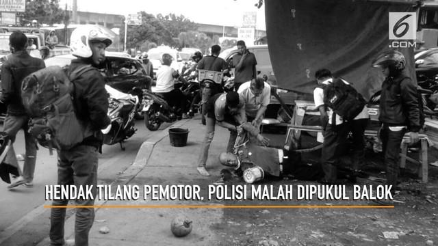 Aiptu Husni berniat menilang motor yang lawan arus di pertigaan Cimanggu, Bogor. Namun pengendara motor yang tak suka malah memukul dengan balok.