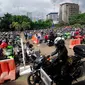 Sebanyak 12 tempat parkir disiapkan di sekitar lokasi uji coba larangan melintas kendaraan roda dua di sepanjang Bundaran HI-Jl Medan Merdeka Barat, mulai 17 Desember mendatang, Jakarta, Kamis (4/12/2014). (Liputan6.com/Johan Tallo)