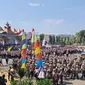 Konsolidasi koordinasi lapangan Aliansi Lampung Menggugat usai membubarkan diri dari aksi di DPRD Lampung, Jumat (23/8/2024). Foto : (Liputan6.com/Ardi).