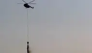 BNPB Kerahkan Dua Water Bombing ke TPA Jatiwaringin