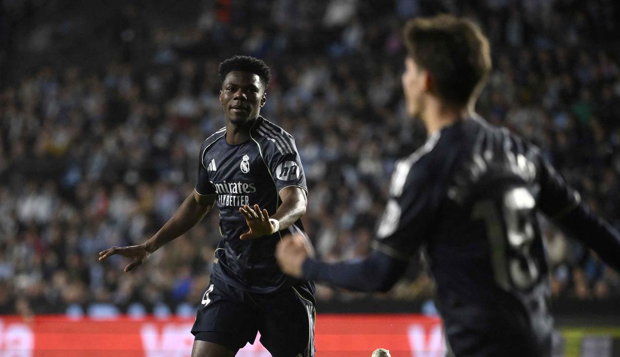 Real Madrid sempat unggul lebih dulu melalui aksi Aurelien Tchouameni pada menit ke-11. Tampak dalam foto, gelandang Real Madrid asal Prancis, Aurelien Tchouameni, merayakan golnya pada pertandingan pekan ke-27 La Liga 2025/2026 melawan Celta Vigo di Estadio Abanca-Balaidos pada Jumat 6 Maret 2026 waktu setempat atau Sabtu 7 Maret 2026 dini hari WIB. (Miguel RIOPA/AFP)