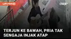 Nasib apes dialami oleh seorang pria yang sedang nongkrong di atas atap bangunan