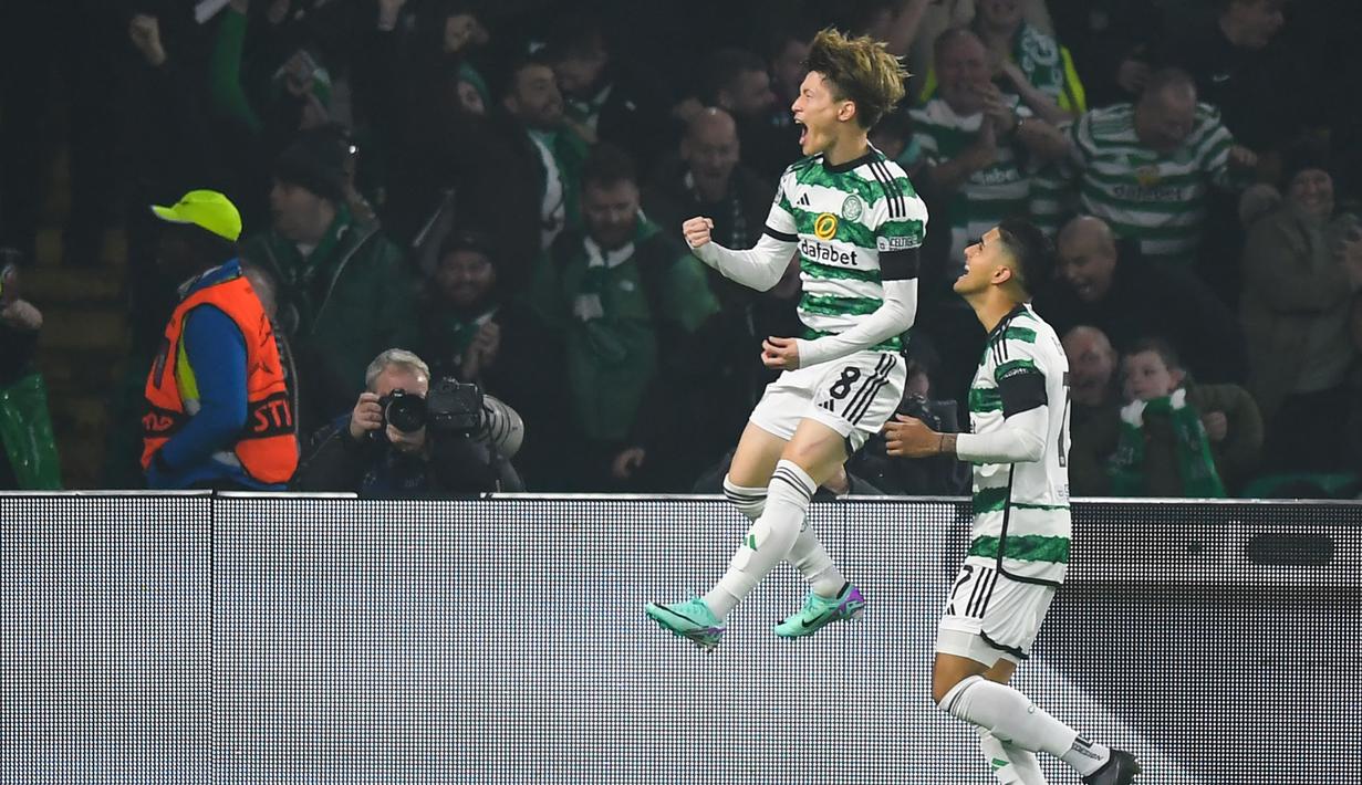 Striker Glasgow Celtic asal Jepang, Kyogo Furuhashi telah mencetak 2 gol dari tiga laga di Liga Champions musim 2023/2024. Kedua gol tersebut dicetaknya masing-masing pada matchday kedua Grup E ke gawang Lazio (4/10/2023) dalam laga yang berakhir 2-1 untuk kemenangan Lazio dan ke gawang Atletico Madrid pada matchday ketiga (25/10/2023) dalam laga yang berakhir imbang 2-2. (AFP/Andy Buchanan)