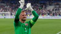 Kasper Schmeichel resmi bergabung dengan Nice, Kamis (4/8/2022). Kiper timnas Denmark itu telah menandatangani kontrak tiga tahun dengan klub Ligue 1 Prancis tersebut. (Geoffroy Van der Hasselt / AFP)