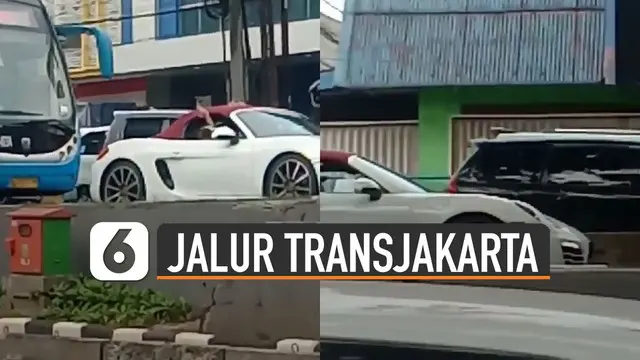Terekam kamera netizen yang sedang melintas, mobil sport masuk jalur Transjakarta.