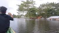 Banjir Konawe, merendam rumah warga hingga setinggi 2 meter.(Liputan6.com/Ahmad Akbar Fua)