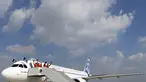 Para insinyur uji terbang merayakan penerbangan pertama Airbus A320neo di Colomiers, Toulouse, Perancis, (25/9/2014). (REUTERS/Regis Duvignau)