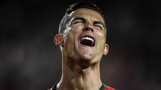 Gelandang Portugal, Cristiano Ronaldo, berteriak saat melawan Ukraina pada laga Kualifikasi Piala Eropa 2020 di Stadion Luz, Lisbon, Jumat (22/3). Kedua negara bermain imbang 0-0. (AFP/Patricia De Melo Moreira)