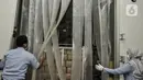 Petugas membuka ruang penyimpanan barang bukti penyelundupan ikan patin fillet ilegal di pangkalan PSDKP, Jakarta, Senin (10/8/2020). Kementerian Kelautan dan Perikanan bersama Polri berhasil mengagalkan penyelundupan 54,9 ton ikan patin yang telah di fillet ilegal. (merdeka.com/Iqbal Nugroho)