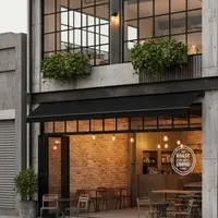 Ilustrasi Rumah dengan Garasi dan Toko (Sumber: Gemini AI)