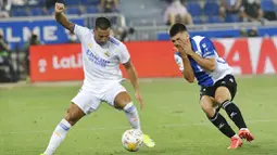 Bertandang ke markas Deportivo Alaves, Estadio Mendizorroza, Minggu (15/08/2021), Real Madrid menang dengan skor meyakinkan 4-1. (Foto: AP/Alvaro Barrientos)