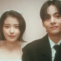 IU Kenakan Veil Dibalut Gaun Pernikahan Putih saat Jadi &ldquo;Pengantin&rdquo; Bersama V BTS. &nbsp;[YouTube/ IU Official]