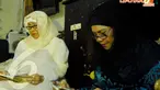 Iin Sina (kiri) mantan istri pertama membacakan doa bersama mantan istri kedua Henny Mariana (kanan) dalam acara 40 Harian Jojon (Liputan6.com/Andrian M Tunay).