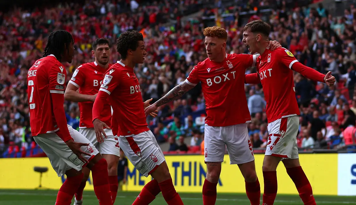 Sebagai tim promosi Liga Inggris pada musim ini, Nottingham Forest melakukan perbaikan di tubuh skuatnya. Mereka diketahui telah mendatangkan 11 pemain baru. Selain itu, ada pula 4 pemain yang dilepas The Forest pada bursa transfer musim panas 2022 ini. (AFP/Adrian Dennis)