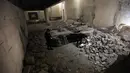 Kondisi Museum Mosul yang diduga dirusak oleh ISIS, Suriah, Senin (13/3). Museum yang didirikan pada 1952 tersebut kini hanya menyimpan puing-puing. (AFP PHOTO/AHMAD AL-RUBAYE)