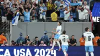 Gelandang Uruguay, Federico Valverde melakukan selebrasi setelah mencetak gol dalam pertandingan sepak bola grup C Copa America 2024 melawan Bolivia di Stadion MetLife di East Rutherford, New Jersey, pada 27 Juni 2024. (CHARLY TRIBALLEAU/AFP)