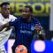 Skor 3-1 tidak berubah hingga akhir pertandingan. Tampak dalam foto, bek Bologna asal Kolombia, Jhon Lucumi (kiri) dan penyerang Inter Milan asal Prancis, Marcus Thuram (kanan), berebut bola selama pertandingan pekan ke-17 Serie A Italia di Stadion San Siro, Milan, Minggu (4/1/2026) waktu setempat atau Senin (5/1/2026) dini hari WIB. (Piero CRUCIATTI/AFP)