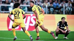 Laga penuh drama ini menghadirkan delapan gol yang semuanya tercipta di babak kedua. Dortmund sempat tiga kali unggul berkat kontribusi Karim Adeyemi, Felix Nmecha, Yan Couto, dan penalti Rami Bensebaini. (Marco Alpozzi/LaPresse via AP)