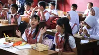Pembiasaan Makan Bergizi Gratis di SD Negeri Parung Serab, Kecamatan Ciledug, Senin, (09/9/2024).
