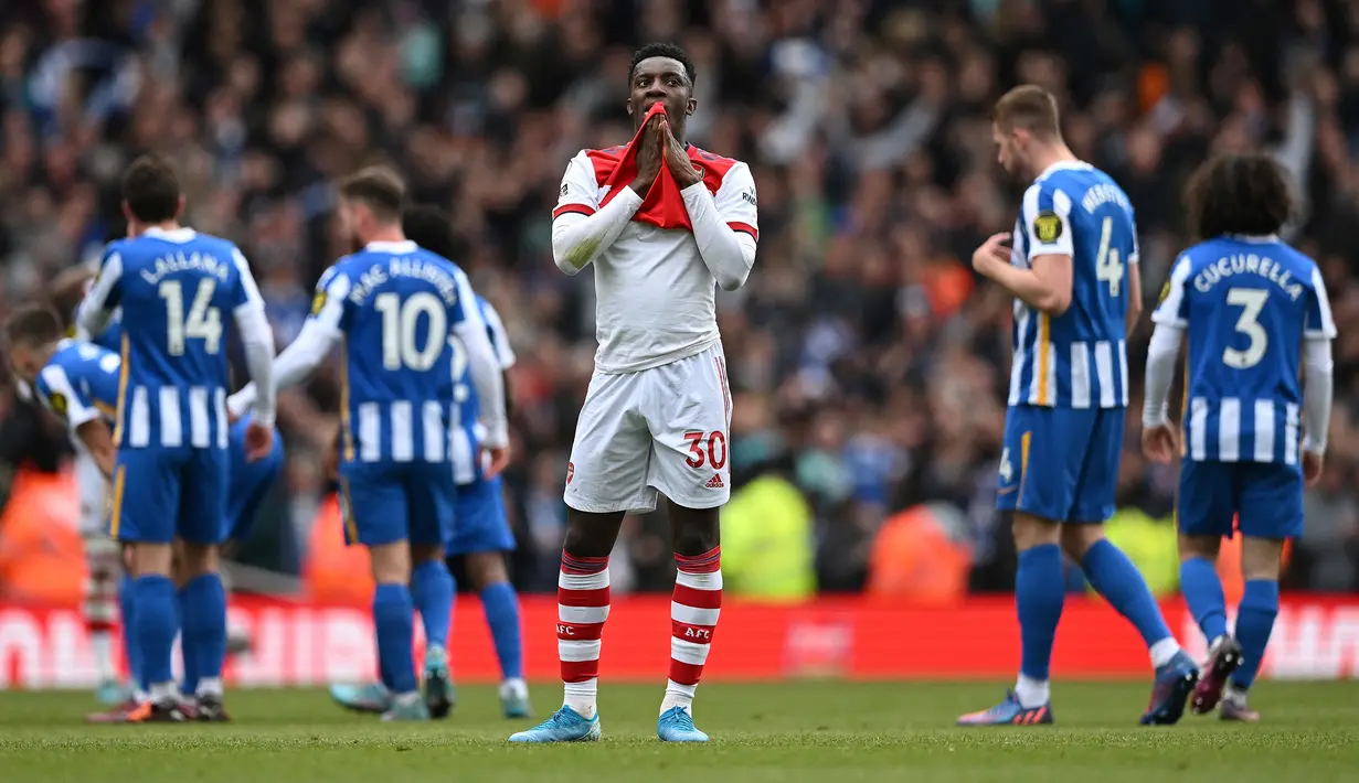 <p>Arsenal. Dalam dua pertemuan di Liga Inggris musim 2021/2022 ini, Arsenal hanya meraup 1 poin alias 1 kali imbang dan 1 kali kalah. Di pertemuan pertama di pekan ke-7 (2/10/2021) Arsenal ditahan imbang 0-0 di kandang Brighton. Sementara pada pertemuan kedua di pekan ke-32 (9/4/2022) Arsenal kalah 1-2 di Emirates Stadium. (AFP/Justin Tallis)</p>