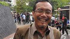 Mantan Menteri Pertanian Suswono mendatangi kantor KPK, Jakarta, Kamis (30/10/2014). (Liputan6.com/Miftahul Hayat)