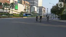 Aktivitas warga di kawasan MH Tharim, Minggu (15/3/2020). Pemerintah Provinsi (Pemprov) DKI Jakarta telah mengumumkan bahwa Minggu pagi ini dan akhir pekan depan tak ada CFD yang biasanya diberlakukan untuk mengantisipasi penyebaran penularan Covid-19. (Liputan6.com/Herman Zakharia)