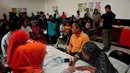 Suasana pencairan dana Program Simpanan Keluarga Sejahtera (PSKS) di Kantor Pos Rawamangun, Jakarta, Rabu (19/11/2014). (Liputan6.com/Johan Tallo)