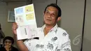 Direktur Pemberantasan BNN, Irjen Deddy Fauzi Elhakim memperlihatkan identitas beberapa tersangka saat rilis kasus narkoba di kantor Badan Narkotika Nasional (BNN), Jakarta, Jumat (22/5/2015). (Liputan6.com/Helmi Afandi)