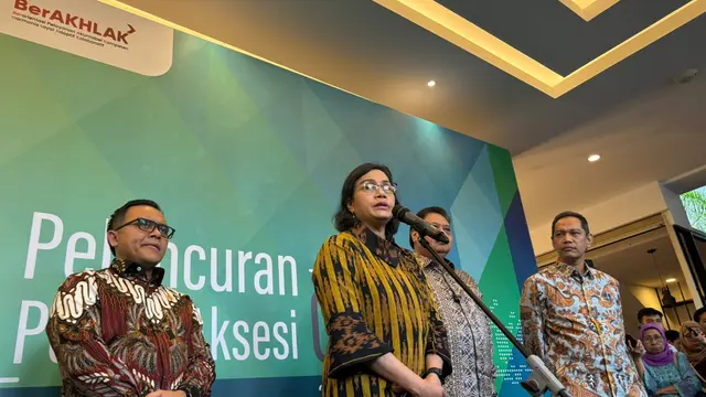 Menteri Keuangan (Menkeu) Sri Mulyani Indrawati dalam peluncuran portal aksesi OECD, di Kementerian Koordinator Bidang Perekonomian, Jakarta, Kamis (3/10/2024). (Tira/Liputan6.com)