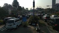 Suasana jalur Puncak pada hari kedua Lebaran, Kamis (6/6/2019). (Liputan6.com/Achmad Sudarno)