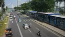 Sejumlah kendaraan bermotor melintas di Jalan Jenderal Sudirman, Jakarta, Rabu (22/5/2019). Adanya unjuk rasa dan kericuhan usai pengumuman hasil Pemilu 2019 menyebabkan ruas jalan protokol tersebut berbeda dengan hari biasa yang diwarnai kemacetan. (Liputan6.com/Immanuel Antonius)