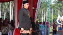 Gubernur DKI Basuki 'Ahok' Tjahaja Purnama memimpin upacara peringatan hari ulang tahun Jakarta ke-489 di Lapangan Monas, Rabu (22/6). Upacara diikuti oleh Pegawai Negeri Sipil pada Pemprov DKI Jakarta. (Liputan6.com/Gempur M Surya)
