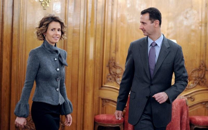 Asma al-Assad bersama sang suami Presiden Bashar al-Assad (AFP)
