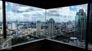 Pemandangan gedung bertingkat terlihat dari sebuah ruangan di ibukota Jakarta, Sabtu, (1/10). Sepanjang tahun 2015, pembangunan gedung bertingkat setinggi 200 mengalami peningkatan di tahun sebelumnya. (Liputan6.com/Fery Pradolo)