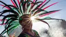 Seorang wanita menghadiri perayaan Hari Tengkorak menjelang hari kematian di Monterrey, Negara Bagian Nuevo Leon, Meksiko pada 27 Oktober 2024. (Julio Cesar AGUILAR/AFP)