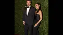David dan Victoria Beckham berpose saat menghadiri Penghargaan Evening Standard Theatre di London, Minggu (30/11/2014). (AFP PHOTO/Justin Tallis)